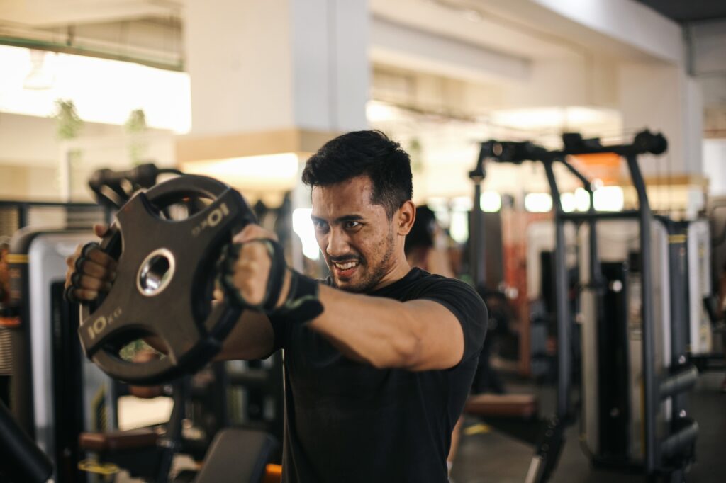 Man Working Out at Gym